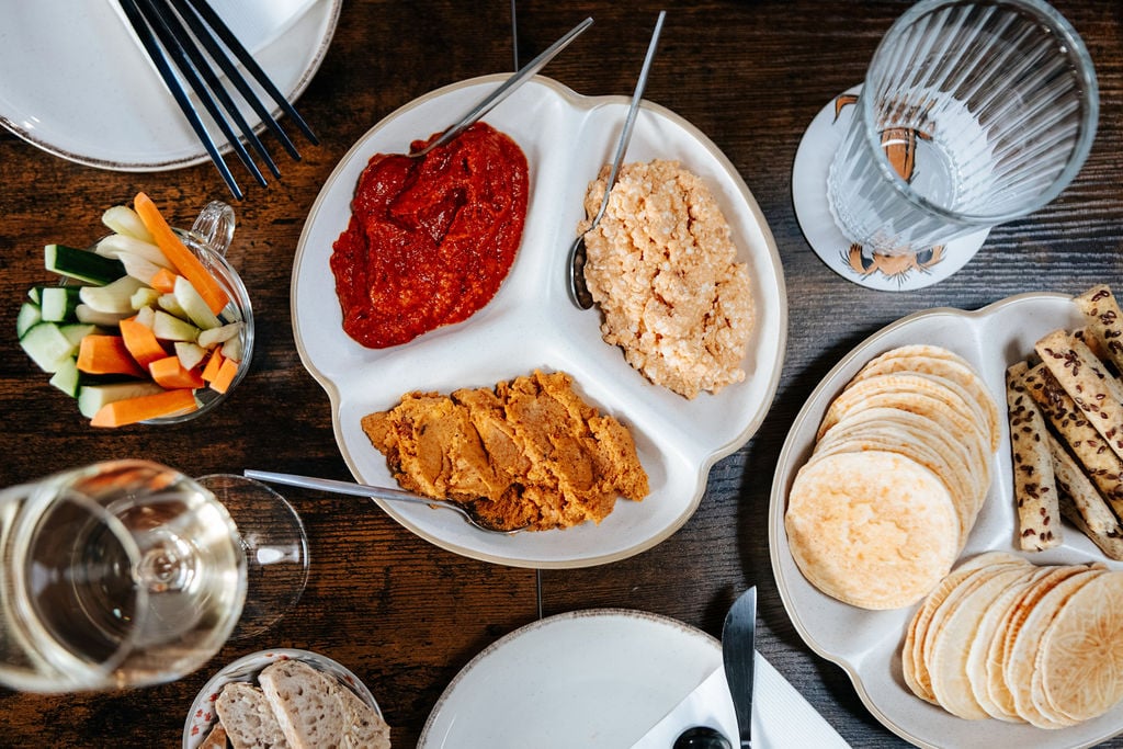 Picture from one of the food stops. It shows home-made crackers and paprika, Liptauer, and pork crackling dips.
